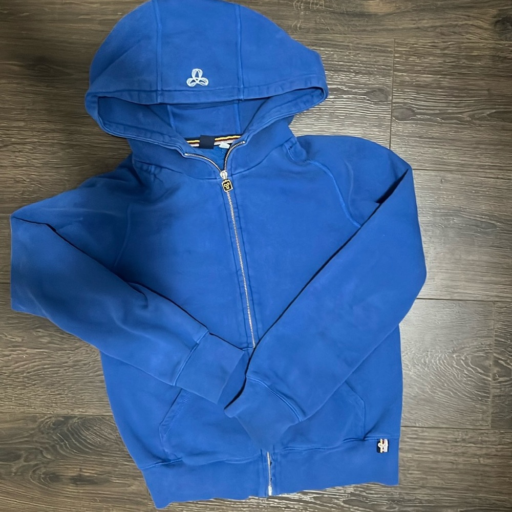 TNA blue zip up